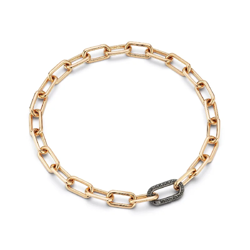 SAXON 18K GOLD CHAIN LINK BRACELET WITH ELONGATED BLACK DIAMOND CLASP